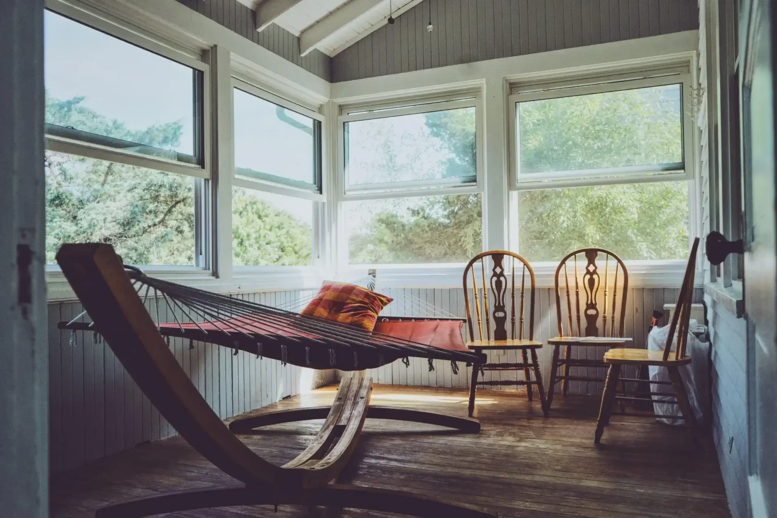 Hammock in cabin with nature view